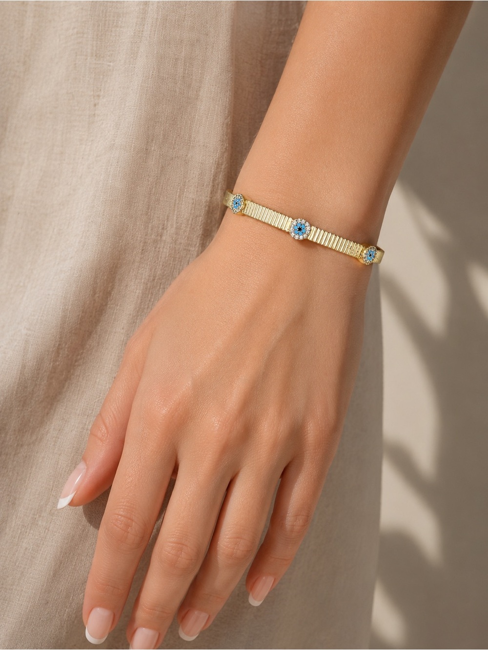 Adina Eden Gold Cuff Bracelet with Blue Crystal Accents
